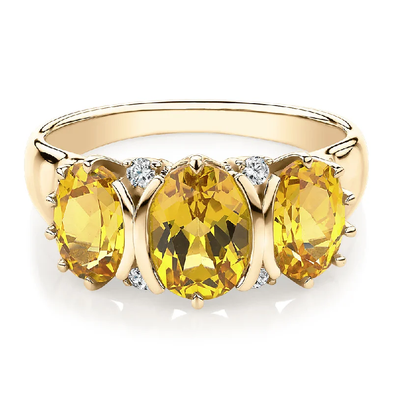 silver eternity rings for women -Dress ring with citrine and diamond simulants in 10 carat yellow gold