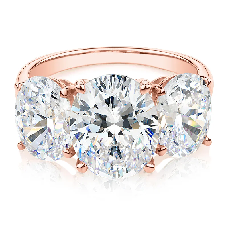 sophisticated rings for women -Three stone ring with 7.57 carats* of diamond simulants in 10 carat rose gold