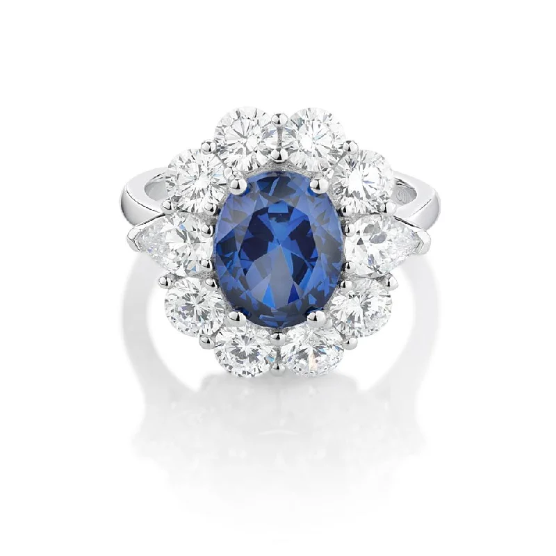 silver rings for women -Dress ring with 10x8mm ceylon sapphire simulant and 2.7 carats* of diamond simulants in 10 carat white gold