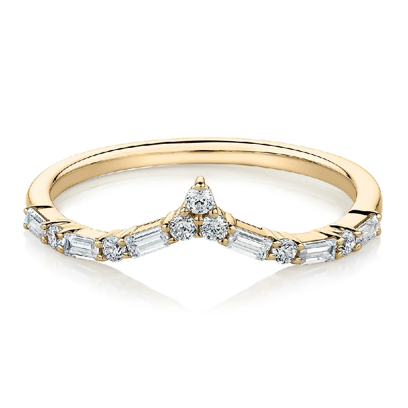 bold rings for women -Baguette curved wedding or eternity band with 0.39 carats* of diamond simulants in 10 carat yellow gold