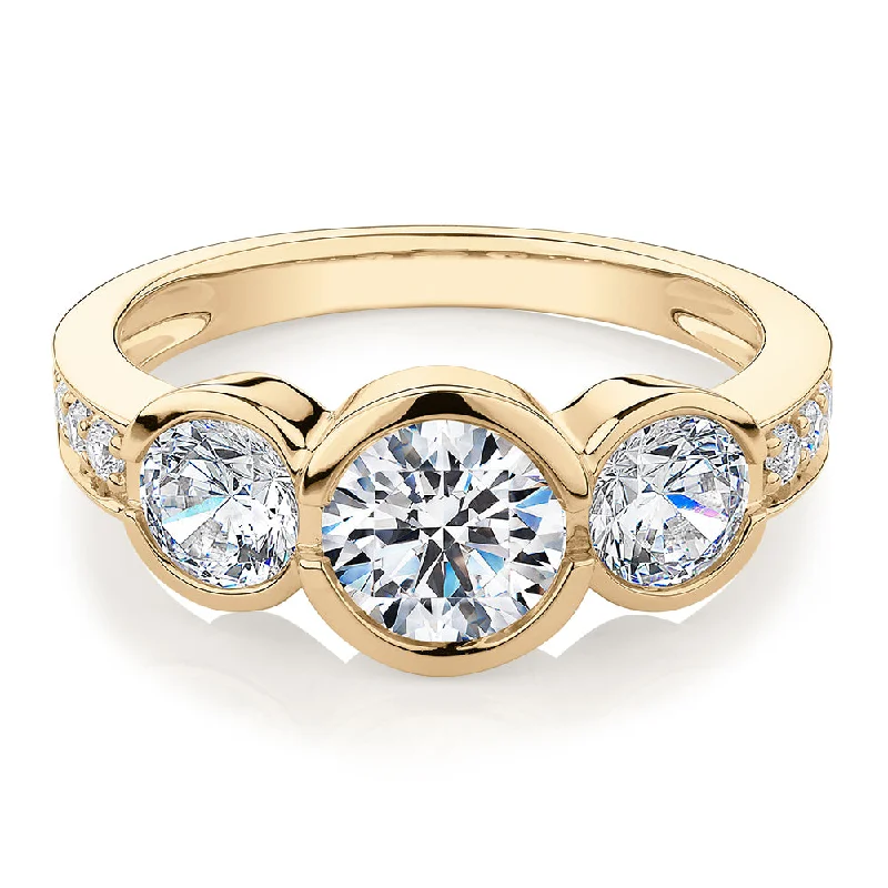 heart-shaped rings for women -Three stone ring with 2.11 carats* of diamond simulants in 10 carat yellow gold