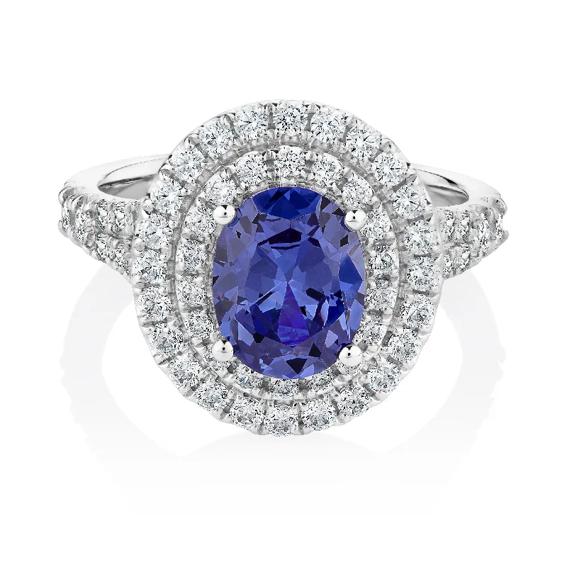 wedding rings for women -Dress ring with 9x7mm tanzanite simulant and 0.66 carats* of diamond simulants in 10 carat white gold