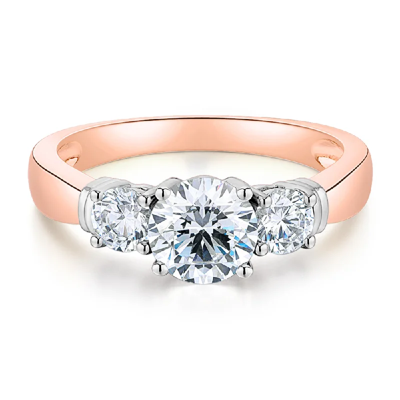 statement rings for women -Three stone ring with 1.53 carats* of diamond simulants in 14 carat rose and white gold