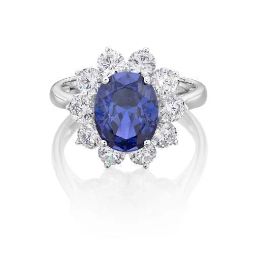 fashion rings for women -Dress ring with 10x8mm tanzanite simulant and 1.7 carats* of diamond simulants in 10 carat white gold