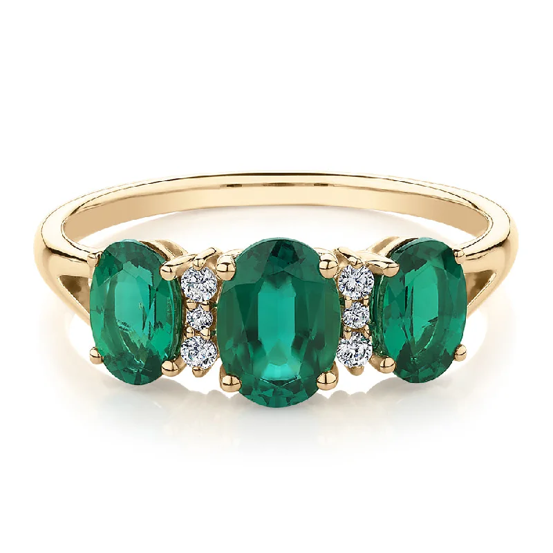 fashion rings for women -Dress ring with emerald and diamond simulants in 10 carat yellow gold