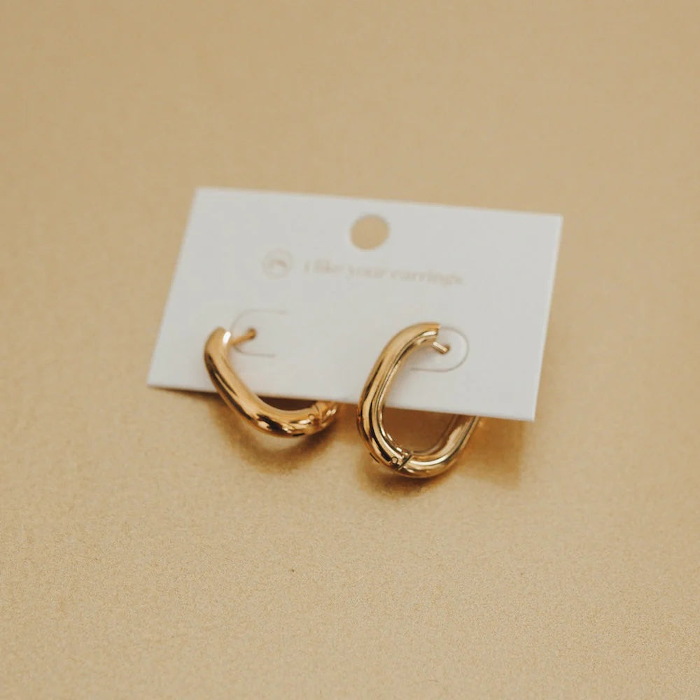 minimalist earrings for women -Flirty Fantasy Oval Hoop Earrings by Pretty Simple