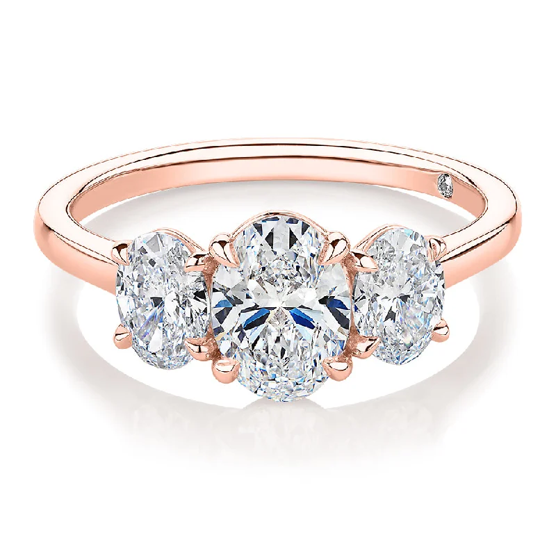 minimalist rings for women -Signature Simulant Diamond 1.87 carat* TW oval three stone ring in 14 carat rose gold