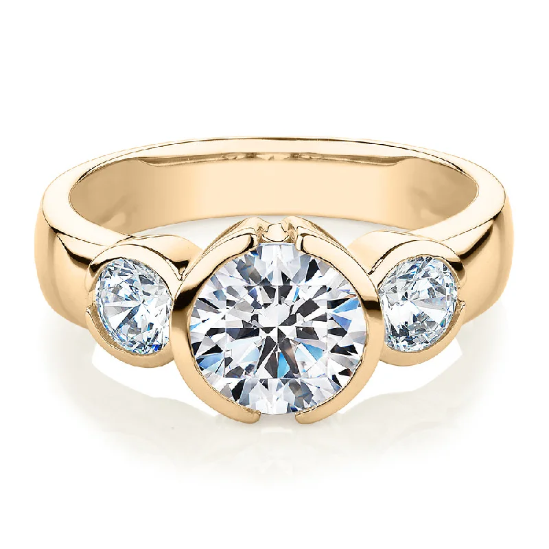 delicate rings for women -Three stone ring with 2.23 carats* of diamond simulants in 10 carat yellow gold