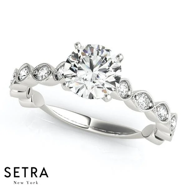 women’s signature engagement rings -ENGAGEMENT RINGS SINGLE ROW PRONG