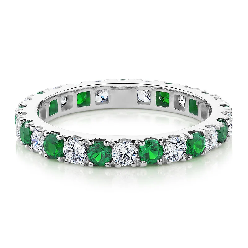 anniversary rings for women -All-rounder eternity band with emerald simulants and 0.78 carats* of diamond simulants in 14 carat white gold