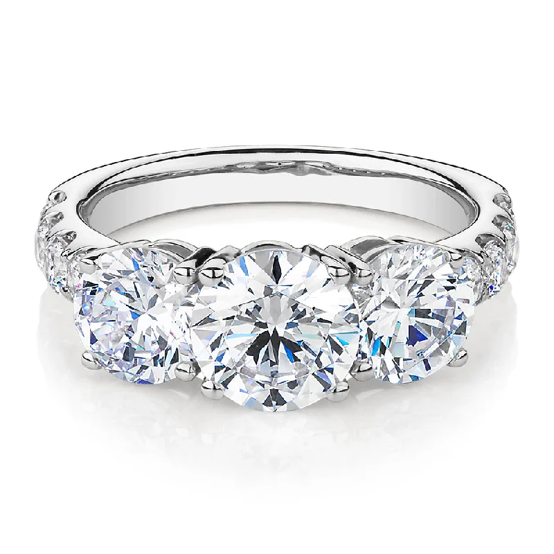 anniversary rings for women -Three stone ring with 3.44 carats* of diamond simulants in 10 carat white gold